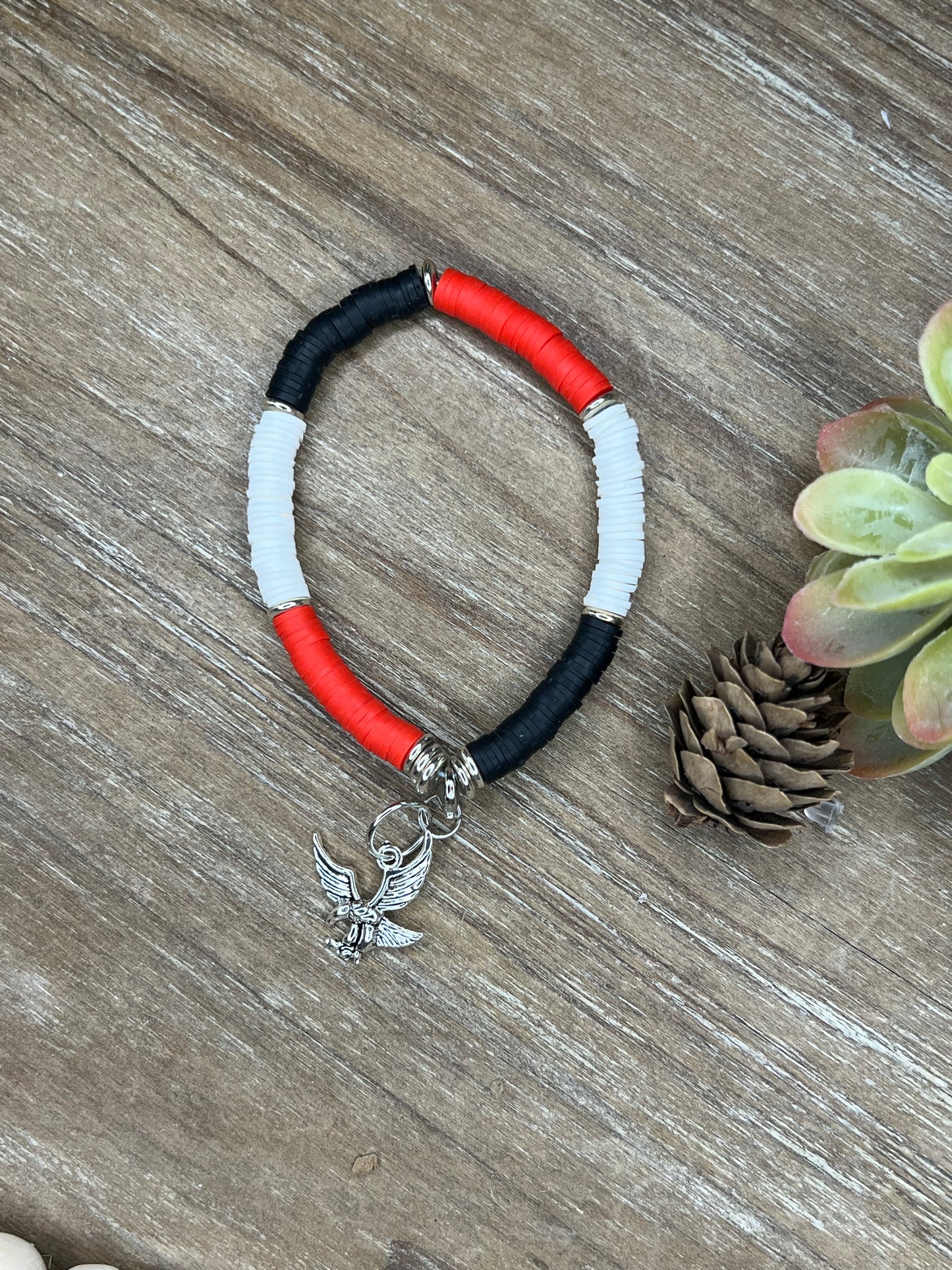 Red, Black, and White Heishi Bracelet with Hawk Charm