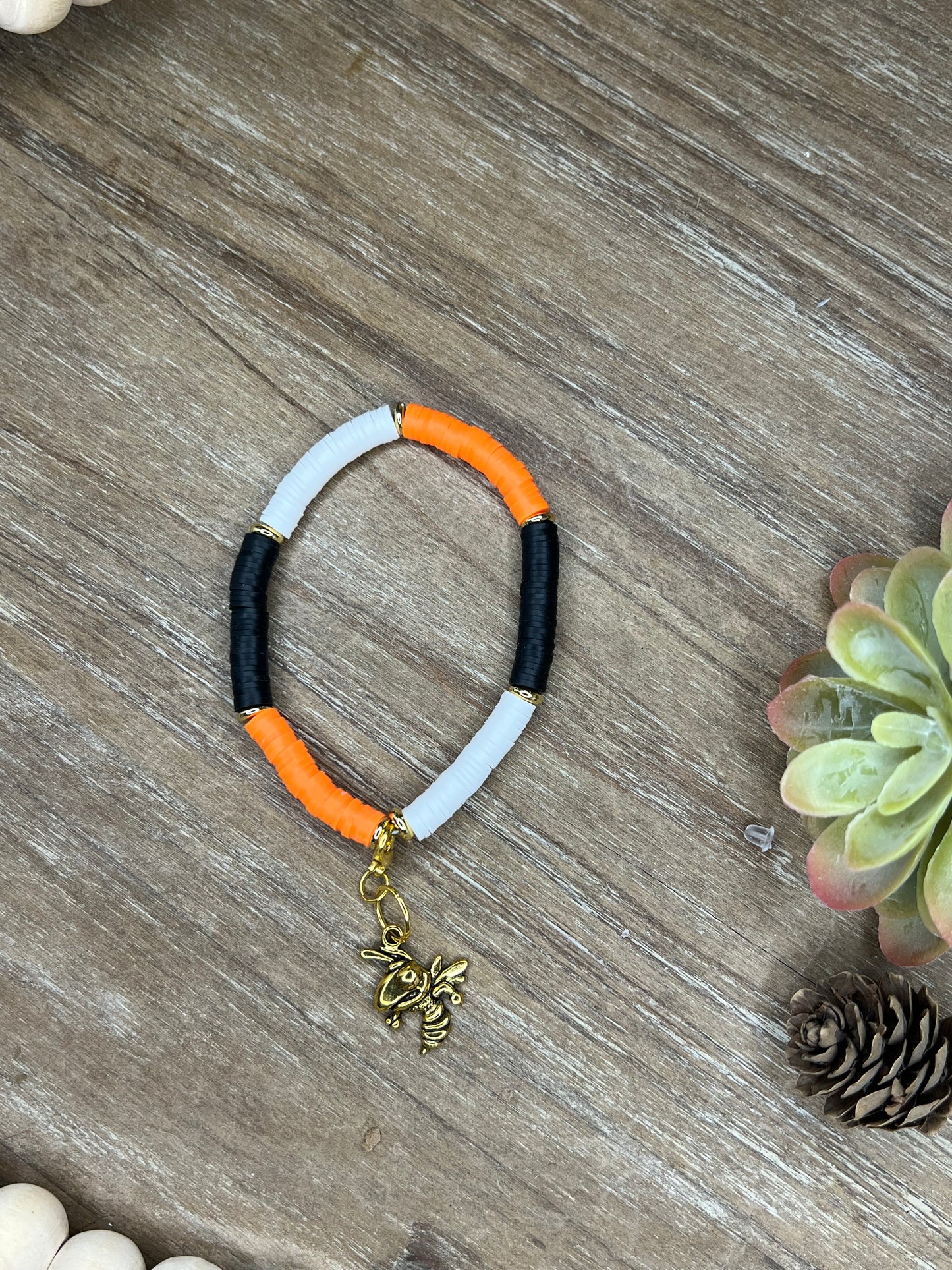 Single Orange, Black, and White Heishe Bracelet with Yellowjacket Charm