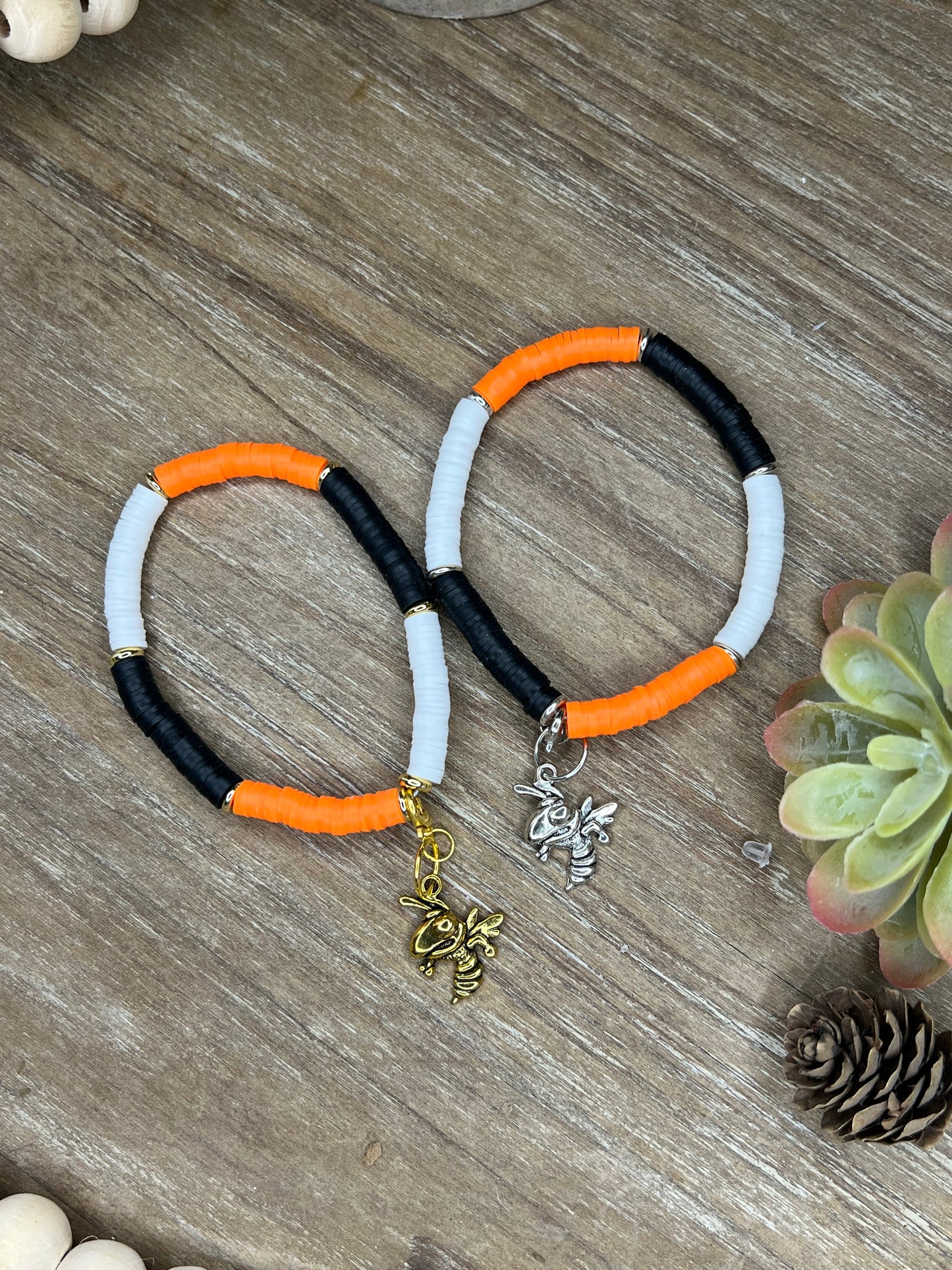 Single Orange, Black, and White Heishe Bracelet with Yellowjacket Charm