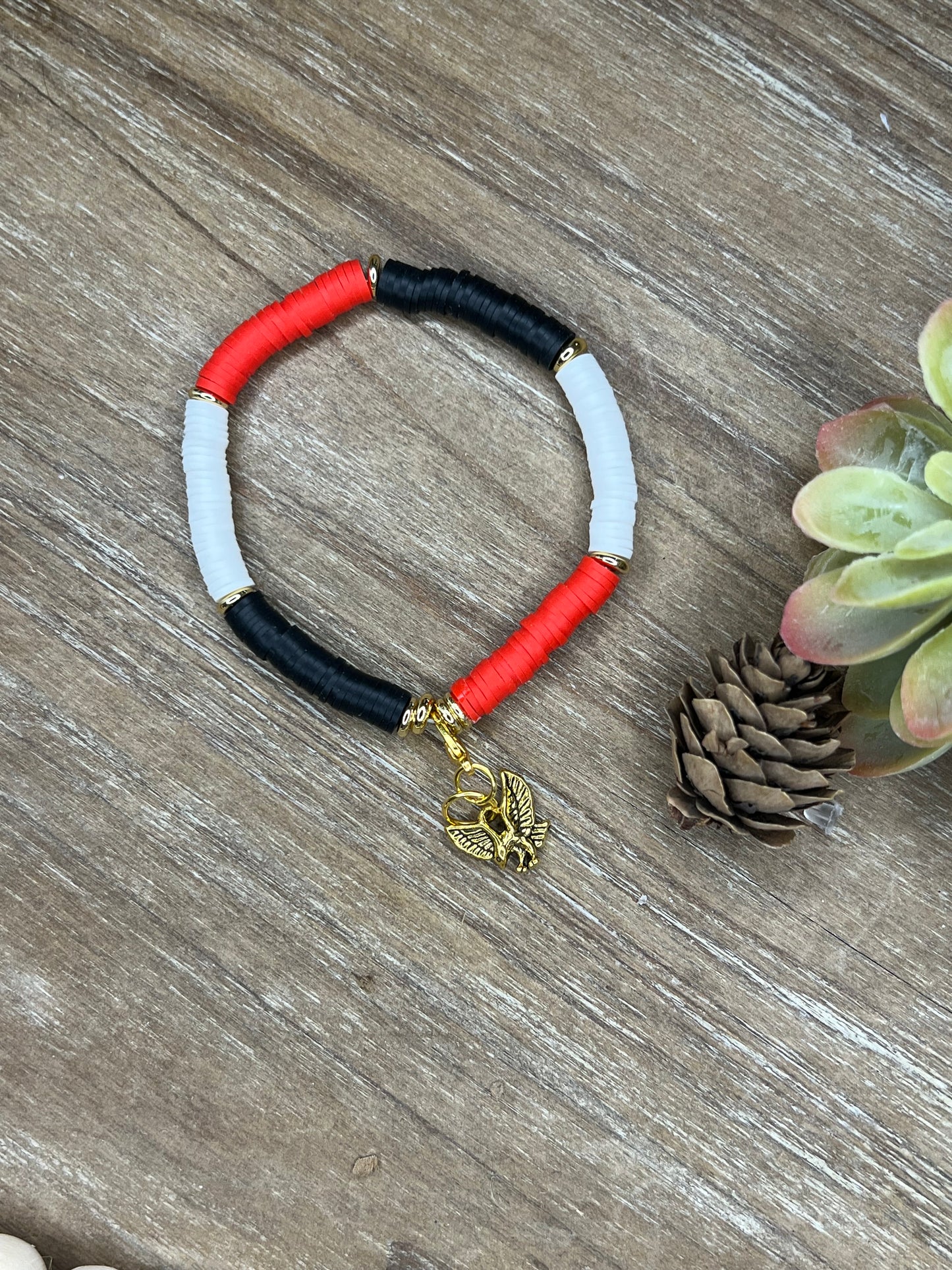 Single Dark Red, Black, and White Heishe Bracelet with Hawk Charm