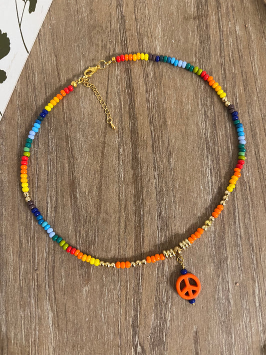 Rainbow Seed Bead Necklace with Orange Peace Sign