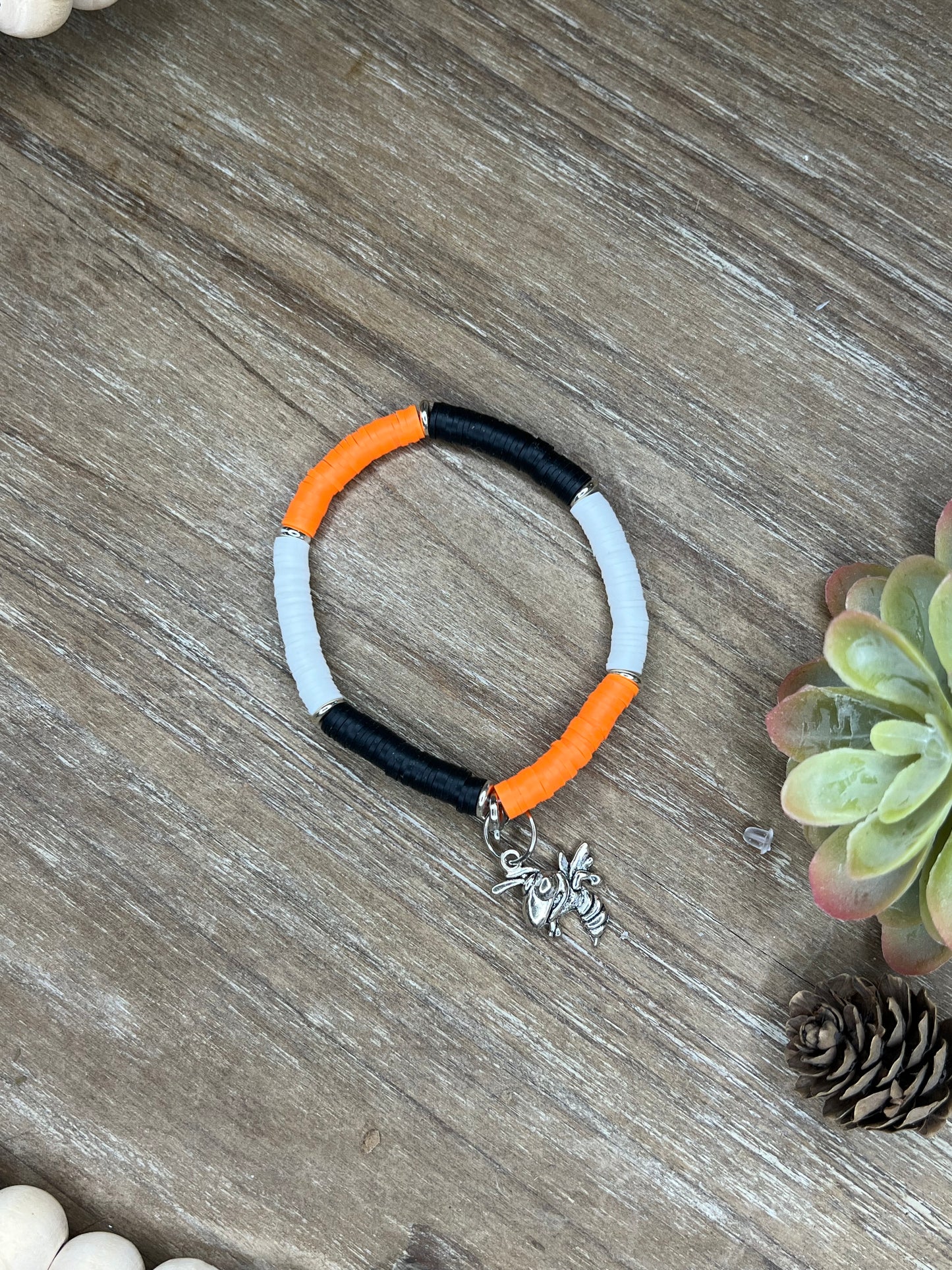 Single Orange, Black, and White Heishe Bracelet with Yellowjacket Charm